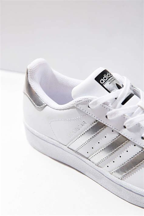 metallic stripe Adidas shoes